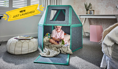 Children's playhouse with a child inside, labeled 'NEW JUST LAUNCHED!' in a room setting.